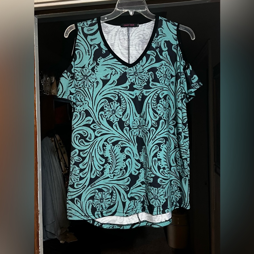 Sz: XL
Crazy Train
Black/Turquoise s/s Double Cold-Shoulder Top
Poly/Spandex